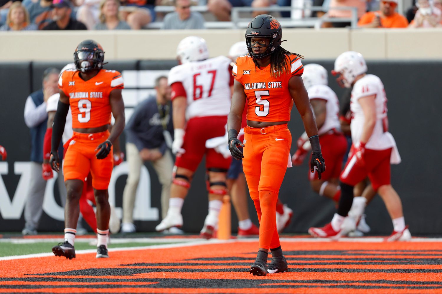 Sep 16, 2023; Stillwater, Oklahoma, USA; Oklahoma State Cowboys safety Kendal Daniels (5) and Oklahoma State Cowboys safety Trey Rucker (9) walk away after a South Alabama touchdown during an NCAA football game between Oklahoma State and South Alabama at Boone Pickens Stadium. Mandatory Credit: Bryan Terry-USA TODAY Sports